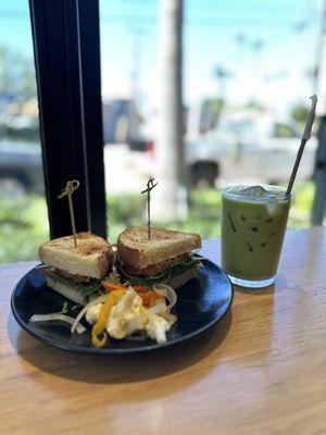 Prosciutto Sandwich with pickled veggies (carrots, cauliflower, bell peppers, onions, celery), and Unsweetened Matcha Latte with oat milk