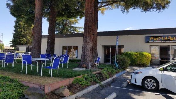 Outdoor Seating available under the shady trees.