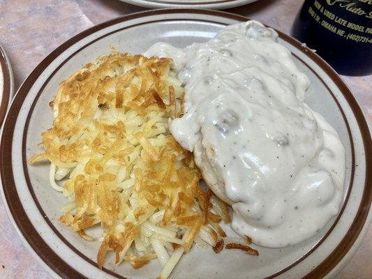 Biscuits and gravy with hashbrowns