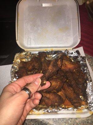 Small, meatless, burnt, dry, sad excuse for what used to be good wings.