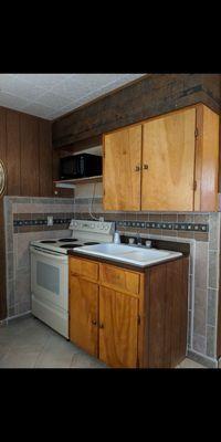 Stove and microwave...plus It doesn't have one of those small fridges...this room had a full size fridge. Awesome!