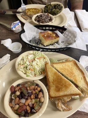 Grilled chicken sandwich, coleslaw & bean salad are excellent. Grilled pork chop, collard greens & speckled butter beans.