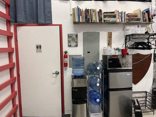 Restroom Door, part of our Library, Shoe & Coat Rack, Fridge & Water Dispenser