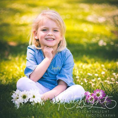 Little flower girl posing for her portrait!