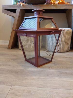 Large metal and glass lantern. New, $119.99. Pottery Barn.