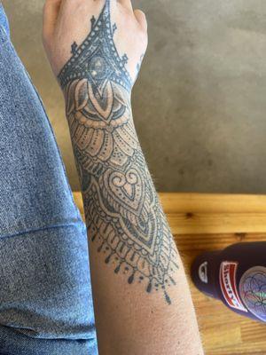 Kevin did the forearm, the hand was done by another artist years ago, (Kevin's work is better)