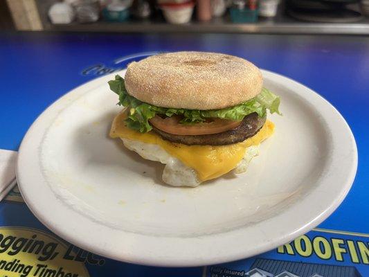 Sausage breakfast sandwich on an English muffin