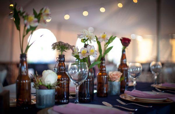 Fun bohemian reception set up by Cover it With Class and Reflections of You