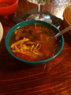 Small bowl of chicken tortilla soup that is served with the Pollo Del Mar.