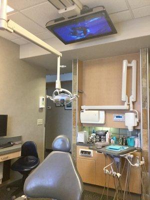 TV's mounted to the ceiling at Pacific Pediatric Dental allow your child to watch a nature movie during their exam.