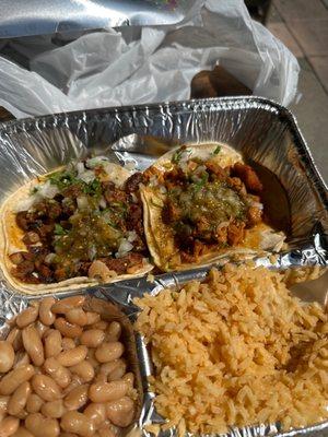 combination plate: mexican rice, beans, & two soft shell tacos: al pastor & pollo