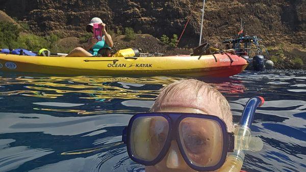 Snorkel below the cliffs.