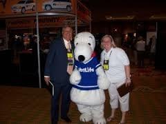 Ken and Kim with Snoopy at the American Agents Alliance Convention in Palm Desert