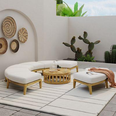 The curve of the Kafelonia Sectional Benches allow them to be arranged in many ways as a unique focal point for any garden niche.