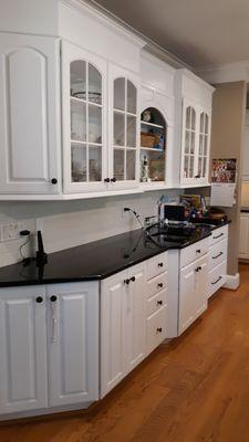 Kitchen cabinet makeover from a wood finish