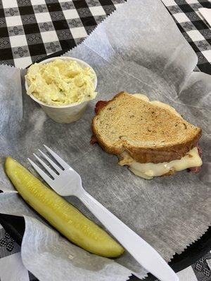 Half Reuben with potato salad.