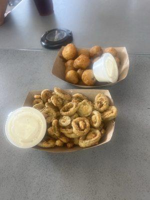 The tiniest appetizer portions. $7 each. Presentation is lacking, just like the portion size.