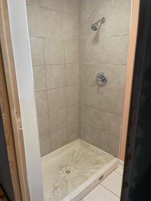 Shower project included base , tile and shower faucet