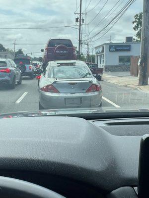 The car being towed almost hit 3 cars because of how the driver was driving.