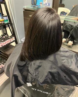 Asymmetrical cut  allover single process color brunette