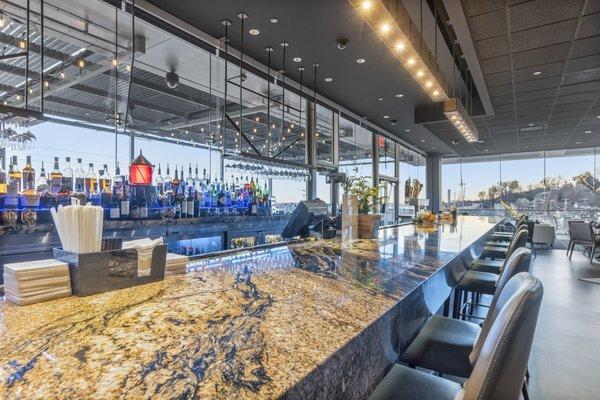 Bar seating with views of the Mississippi River.