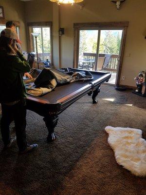 Replacing your pool table for more room in the basement? Give us a call.