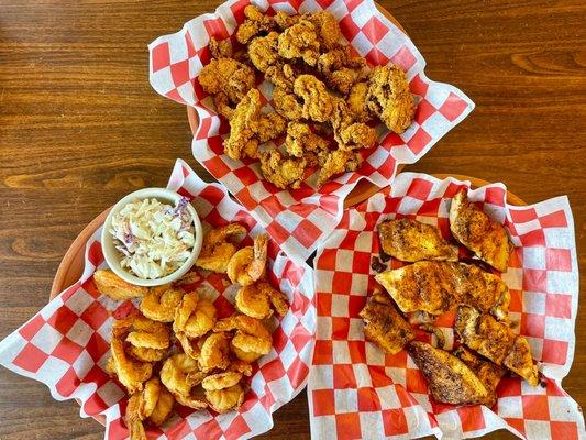 One pound each of fried oysters, fried shrimp, and blackened drum. Outstanding!