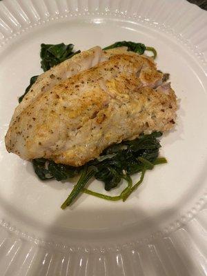 Pan seared trout with dion/butter sauce with sautéed spinach.