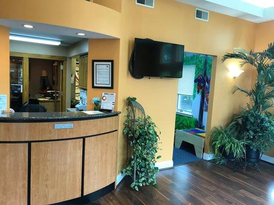 Front desk and TV that displays educational slide shows!