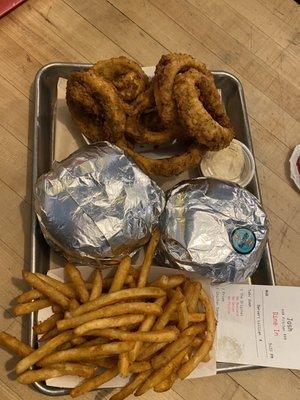 Breaded Onion Rings, Fries, and two burgers