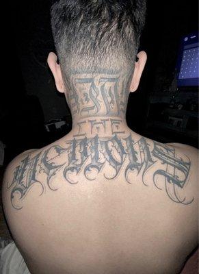 neck tattoo lettering