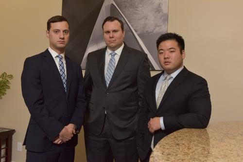 Left to Right: Attorney Aaron Mallonee, Attorney John Schleiffarth, Attorney Shin Cho