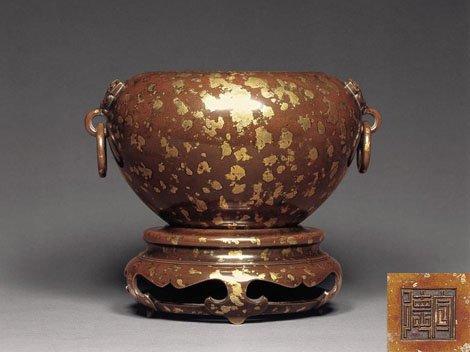 Gilt splashed Chinese Ming dynasty bronze.