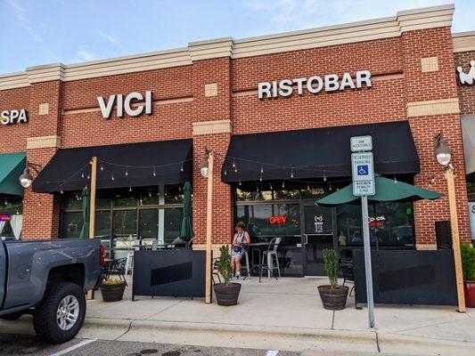 Outside. Storefront. Patio. Located in the Hope Valley Commons shopping center with Harris Teeter (but different side of shopping center).