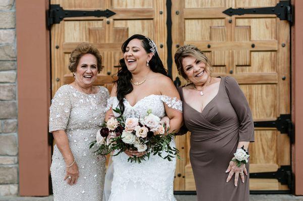 Candid moment of my wife, her mother, and my mother, between shots.