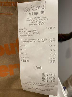 Incorrect receipt that Kennedy from Hooters rung up for 10 wings when it should've been the 20 that I actually paid Uber Eats