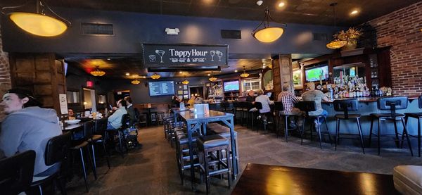 Bar area with five televisions for football