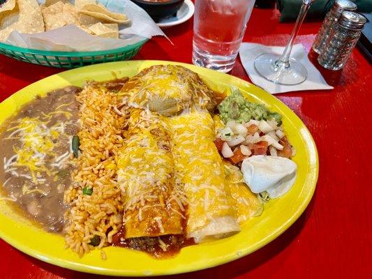 Combo meal. Shrimp enchilada, beef enchiladas, and a seriously over stuffed beef chili relleones.