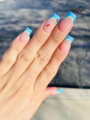 blue french tips with cherries