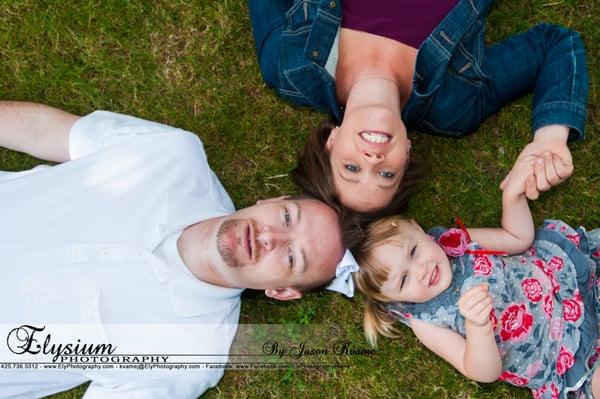 A relaxed family portrait laying in the grass! What could be more fun?