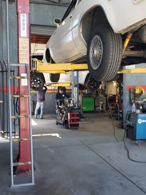 Jeep on racks in back