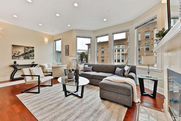 Breathing life into this apartment. Love the big windows!