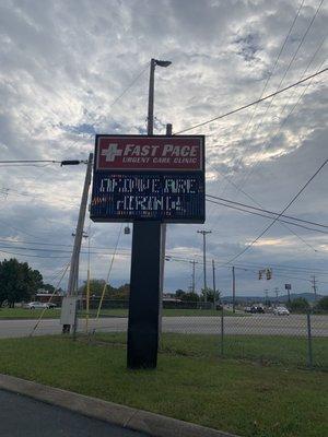 Sign out in front of building across from Walmart