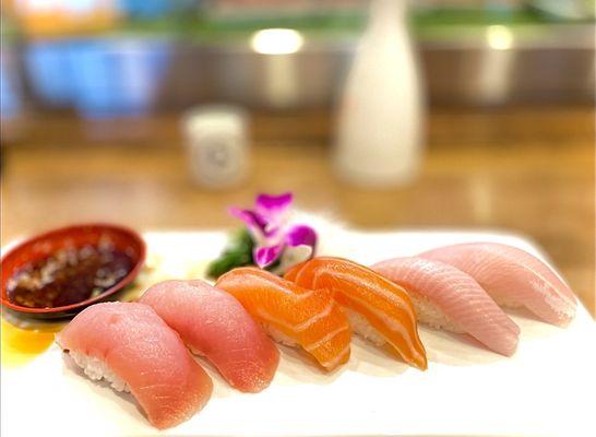 Albacore(White tuna), salmon and yellowtail nigiri.