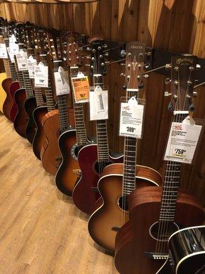 Wall of acoustic guitars