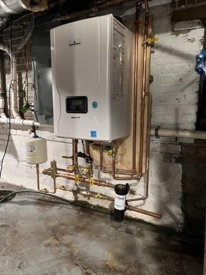 Tankless combi boiler