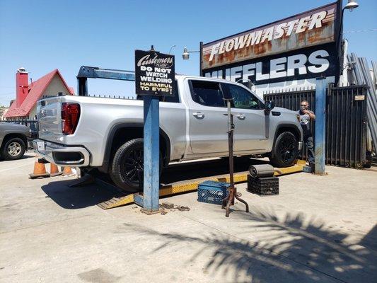 Magnaflow turn down exhaust. AMAZING sound, no drone inside the cab.