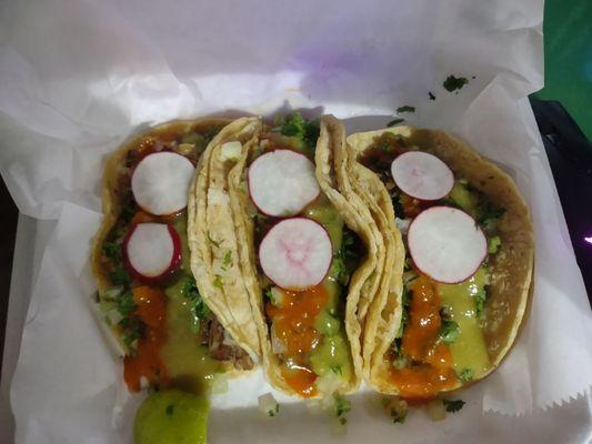 Tacos. Two beef (asada) and one Mexican pulled pork (carnitas)