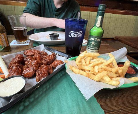 Delish wings and fries.