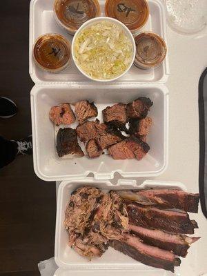 Ribs, slaw, burnt ends, pulled pork, and sauce.